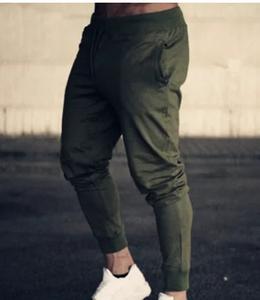 Pantalones deportivos grises para correr con músculos para hombre