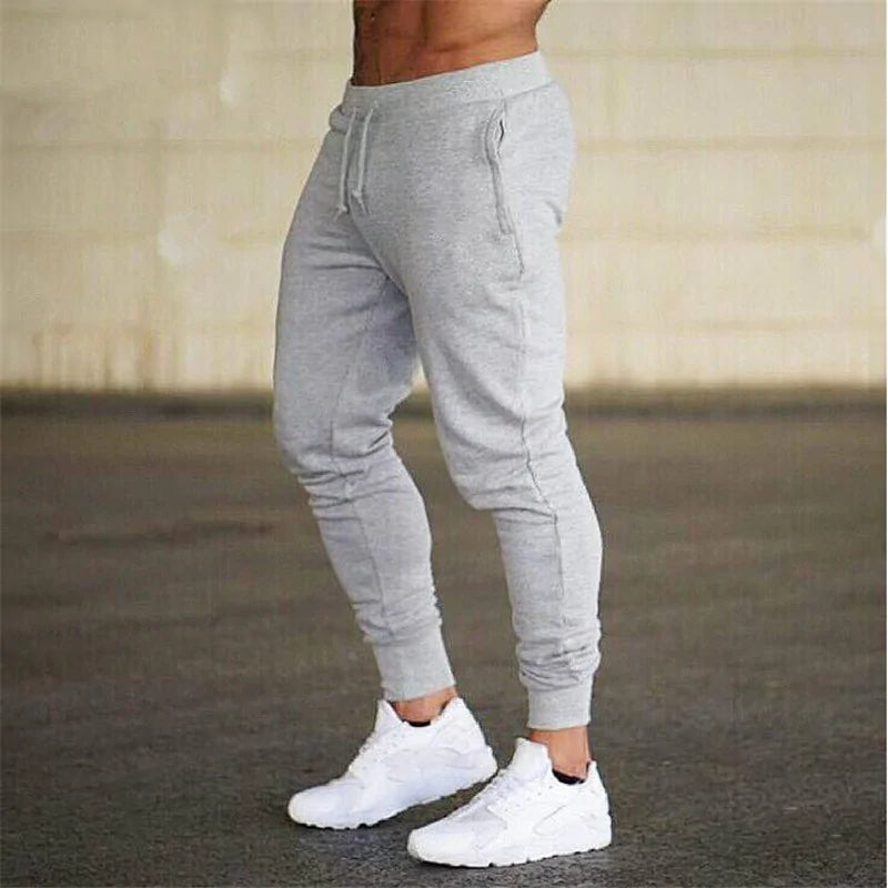 Pantalones deportivos grises para correr con músculos para hombre