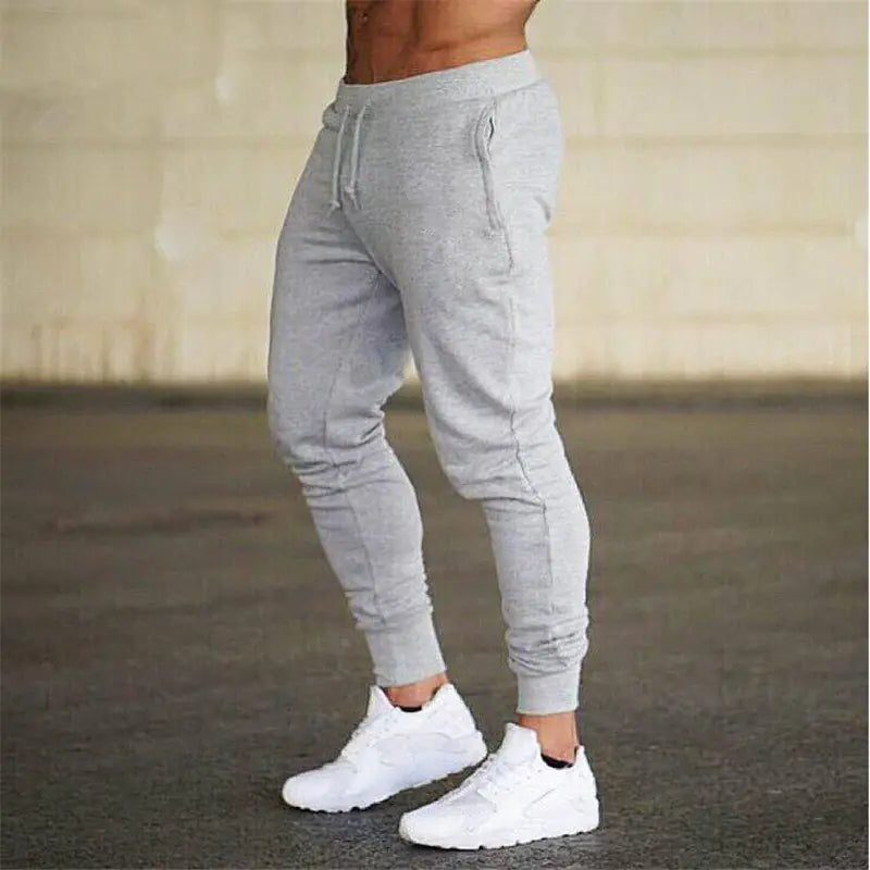 Pantalones deportivos grises para correr con músculos para hombre