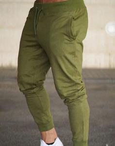 Pantalones deportivos grises para correr con músculos para hombre