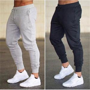 Pantalones deportivos grises para correr con músculos para hombre