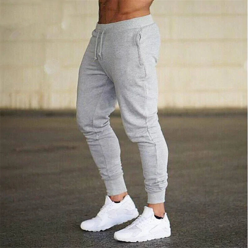 Pantalones deportivos grises para correr con músculos para hombre